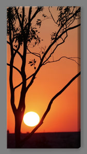'Holding up the Sunset' Canvas Print